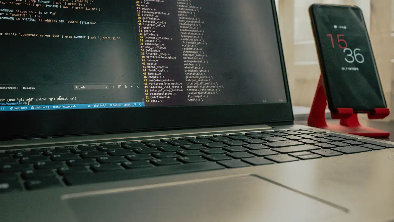 Laptop and phone on a desk