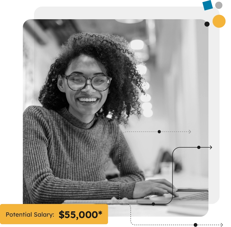 smiling woman using laptop, potential salary $76,000