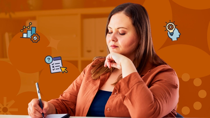 Female student taking notes in preparation for the PMP exam
